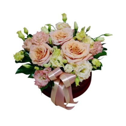 Aranjament floral în cutie rotundă din catifea